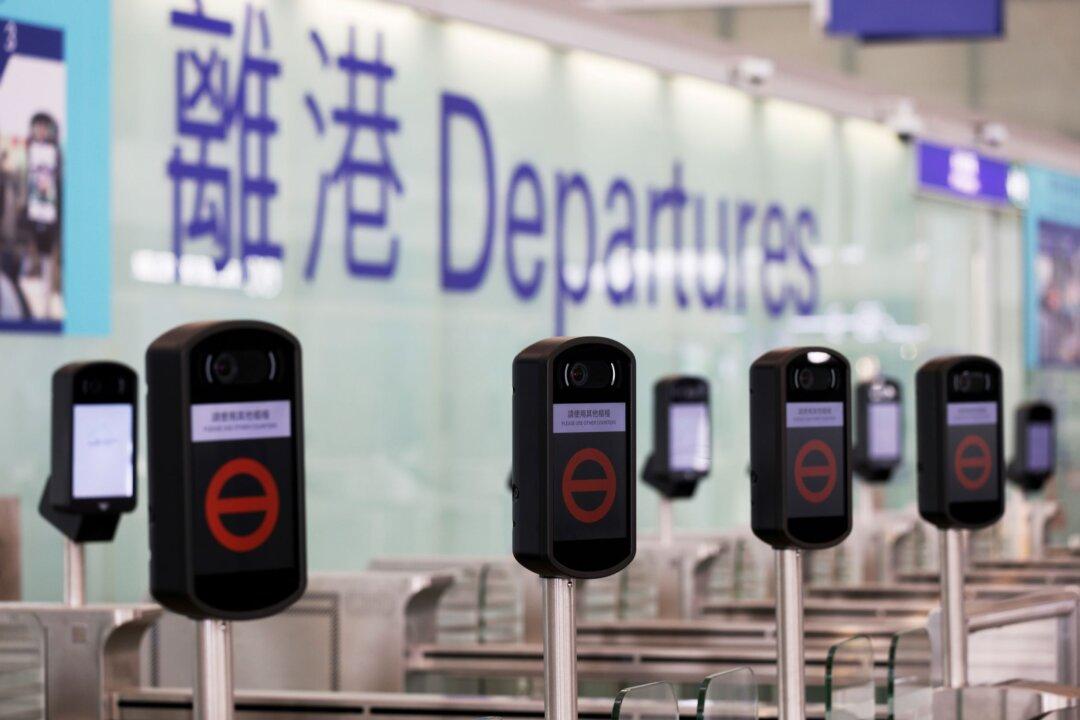 Hong Kong Bans Passenger Flights From UK to Curb COVID-19