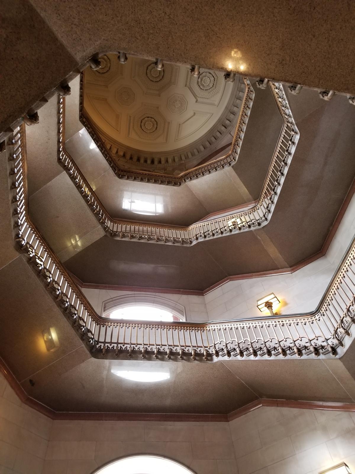 One of the staircases in the north and south portals. The grand scale is felt upon looking up at the coffered ceiling, seven stories above the ground. (Antigng/CC BY-SA 4.0)