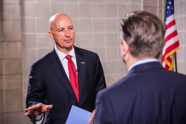 Nebraska Gov. Pete Ricketts (L) and Jan Jekielek, host of The Epoch Times' "American Thought Leaders," in Lincoln, Neb., on June 24, 2021. (Petr Svab/The Epoch Times)