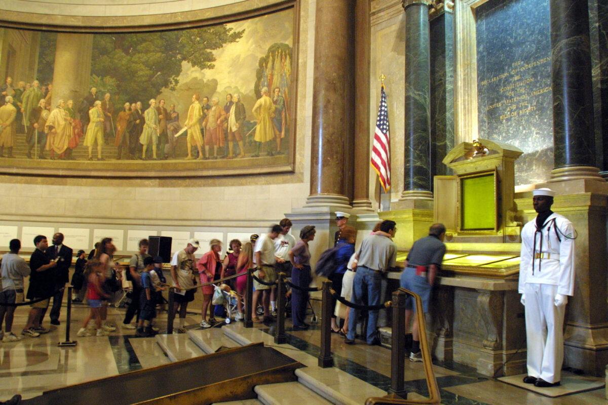 Visitors wait in line to view the original copies of the Declaration of Independence, the Constitution and the Bill of Rights at the National Archives in Washington, D.C. (Alex Wong/Getty Images)