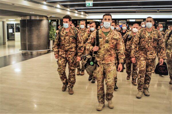 Italian Army soldiers of the last Italian troops withdrawing from Afghanistan walk in the airport in Pisa, Italy, on June 29, 2021. (Italian Defense Ministry via AP)