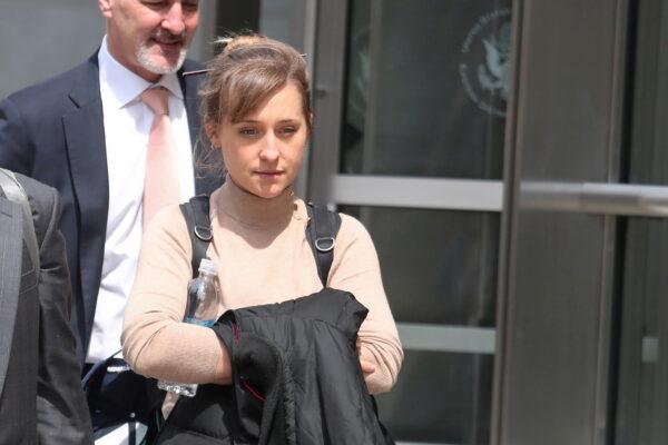 Actress Allison Mack departs the Brooklyn Federal Courthouse after facing charges regarding sex trafficking and racketeering related to the NXIVM cult case in New York, on April 8, 2019. (Shannon Stapleton/File Photo/Reuters)