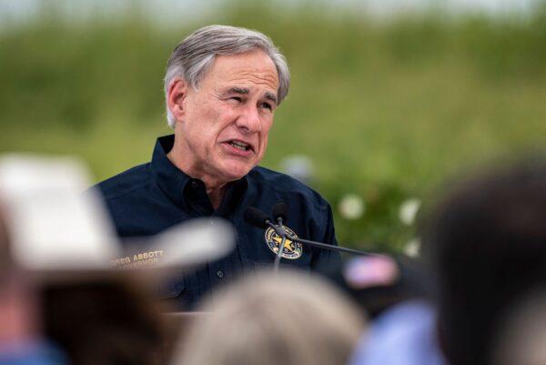 Texas Governor Greg Abbott speaks during a visit to the border wall near Pharr, Texas on June 30, 2021. (Sergio Flores/AFP via Getty Images)