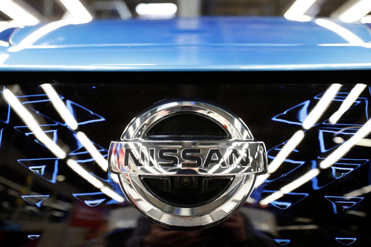 The logo of Nissan is seen on a car ahead of a news conference at Nissan's Sunderland plant in Britain, on July 1, 2021. (Phil Noble/Reuters)