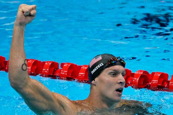 Caeleb Dressel, of United States, celebrates winning the gold medal the men's 50-meter freestyle final at the 2020 Summer Olympics in Tokyo, Japan, on Aug. 1, 2021. (Jae C. Hong/AP Photo)