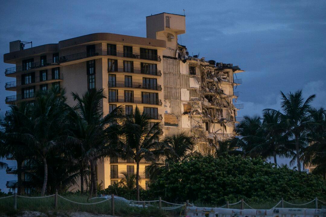 Safety Concerns Halt Rescue Efforts at Condo Collapse Site