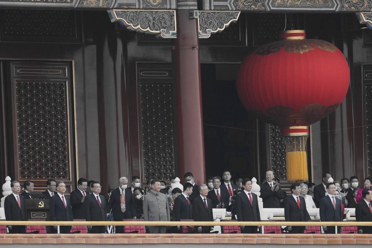 Chinese leader Xi Jinping (C), standing with former leader Hu Jintao, attends the celebration marking the 100th anniversary of the Chinese Communist Party at Tiananmen Square in Beijing, China, on July 1, 2021. (Lintao Zhang/Getty Images)