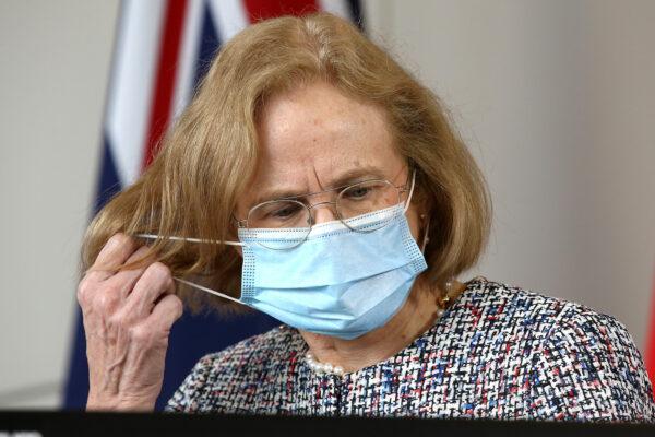 Queensland's Chief Health Officer, Dr Jeannette Young, takes off her face mask to speak during a press conference in Brisbane, Australia, on June 29, 2021. (Jono Searle/Getty Images)