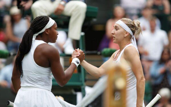 Coco Gauff of the U.S. shakes hands with Russia's Elena Vesnina after winning their second round match, on the fourth day of the 2021 Wimbledon Championships at The All England Tennis Club in Wimbledon, London, Britain, on July 1, 2021. (Paul Childs/Reuters)