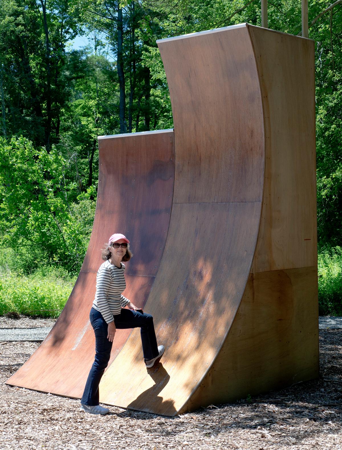 Jeanie Stiles in front of a completed warped wall, a must-have in any ninja adventure course. (Simon Jutras)