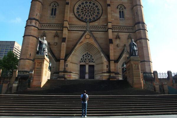 A man is seen praying outside St. Mary's Cathedral in Sydney, Australia, on Oct. 23, 2020. (Lisa Maree Williams/Getty Images)