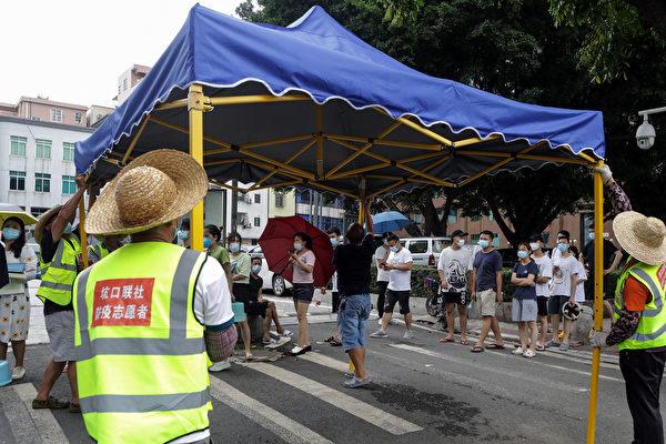 China’s Virus Hotspot Lifts Lockdown But Sets Up Large Makeshift Quarantine Site