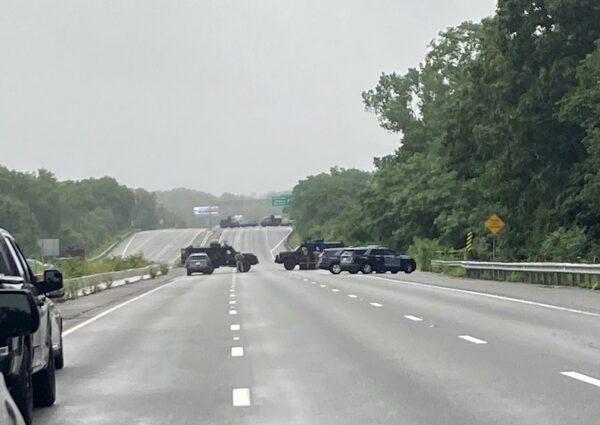 This photo provided by Massachusetts State Police shows police blocking off a section of Interstate 95 near Wakefield, Mass., on July 3, 2021. (Massachusetts State Police via AP)