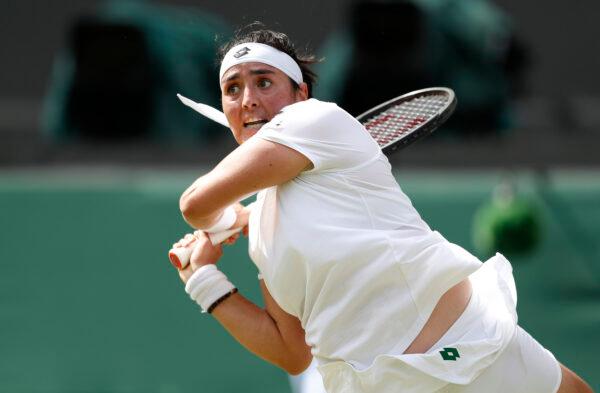 Tennis - Wimbledon - All England Lawn Tennis and Croquet Club, London, Britain on July 2, 2021, Tunisia's Ons Jabeur in action during her third round match against Spain's Garbine Muguruza. (Peter Nicholls/Reuters)
