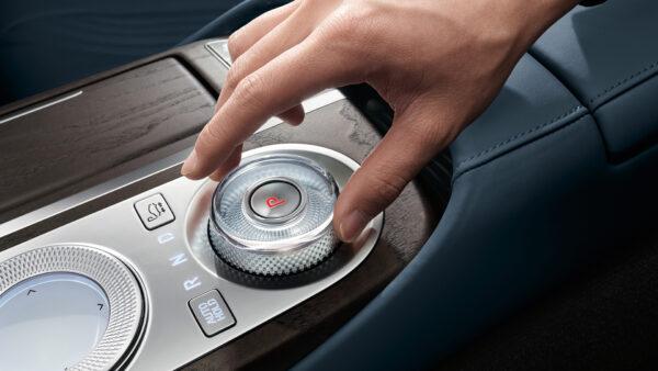 Rotary shift dial behind the infotainment touch controller. (Courtesy of Genesis)