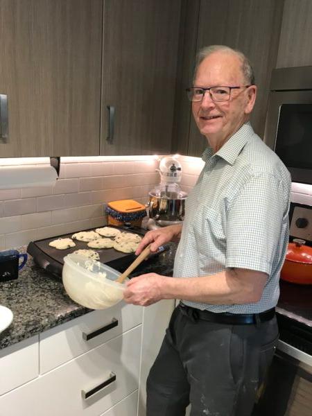 The author griddling a fresh batch of blueberry pancakes. (Courtesy of Stephen A. Sands)