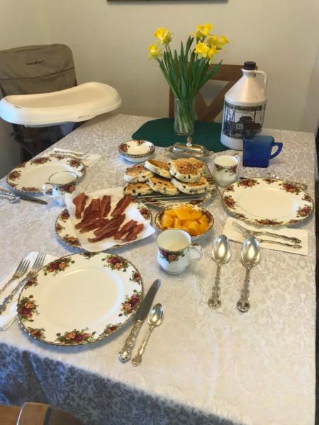 The table is set—including a blue syrup pitcher from the author's mother’s marriage gifts—and breakfast is served! (Courtesy of Stephen A. Sands)