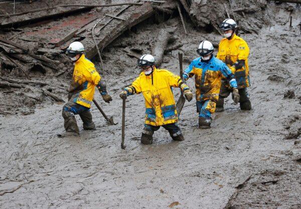 Rescuers conduct a search operation at the site of a mudslide at Izusan in Atami, Shizuoka prefecture, southwest of Tokyo, Japan, on July 4, 2021. (Kyodo News via AP)