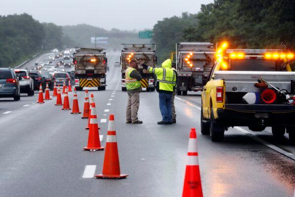 Traffic on Interstate 95 is diverted in the area of an hours long standoff with a group of armed men that partially shut down the highway, in Wakefield, Mass., on July 3, 2021. (Michael Dwyer/AP Photo)