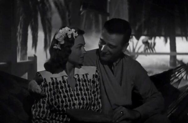 Lt. Sandy Davyss (Donna Reed) and Lt. “Rusty” Ryan (John Wayne) get romantically involved, in “They Were Expendable.” (Metro-Goldwyn-Mayer)