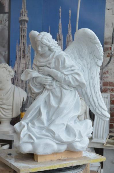 “Angel in Prayer,” 2020, by Cody Swanson. Marble. Church of Saint Mary of Mercy, Benedictine Monastery in Norcia, Italy. (Courtesy of Cody Swanson)