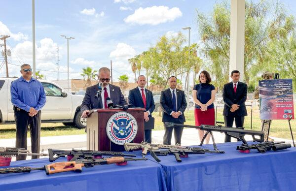 Joseph Lestrange, acting deputy assistant director of HSI's transnational organized crime division, speaks to media in front of seized weapons in Laredo, Texas, on July 2, 2021. (Charlotte Cuthbertson/The Epoch Times)
