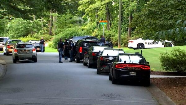 Cobb County police converge on the Pinetree Country Club after the club pro's body was found on the course, in Kennesaw, Ga., on July 3, 2021. (Courtesy of WGCL)