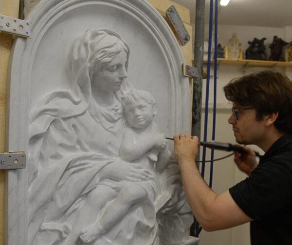 “Madonna and Child With Goldfinch,” 2020, by Cody Swanson. Carrara Marble. Church of St. Mary of Mercy, Benedictine Monastery in Norcia, Italy. (Courtesy of Cody Swanson)