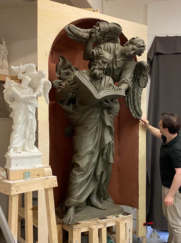 “Saint Matthew,” one of the Four Evangelists, 2021, by Cody Swanson. Clay in progress. Chapel of the Holy Cross, Jesuit High School, Tampa, Fla. (Courtesy of Cody Swanson)