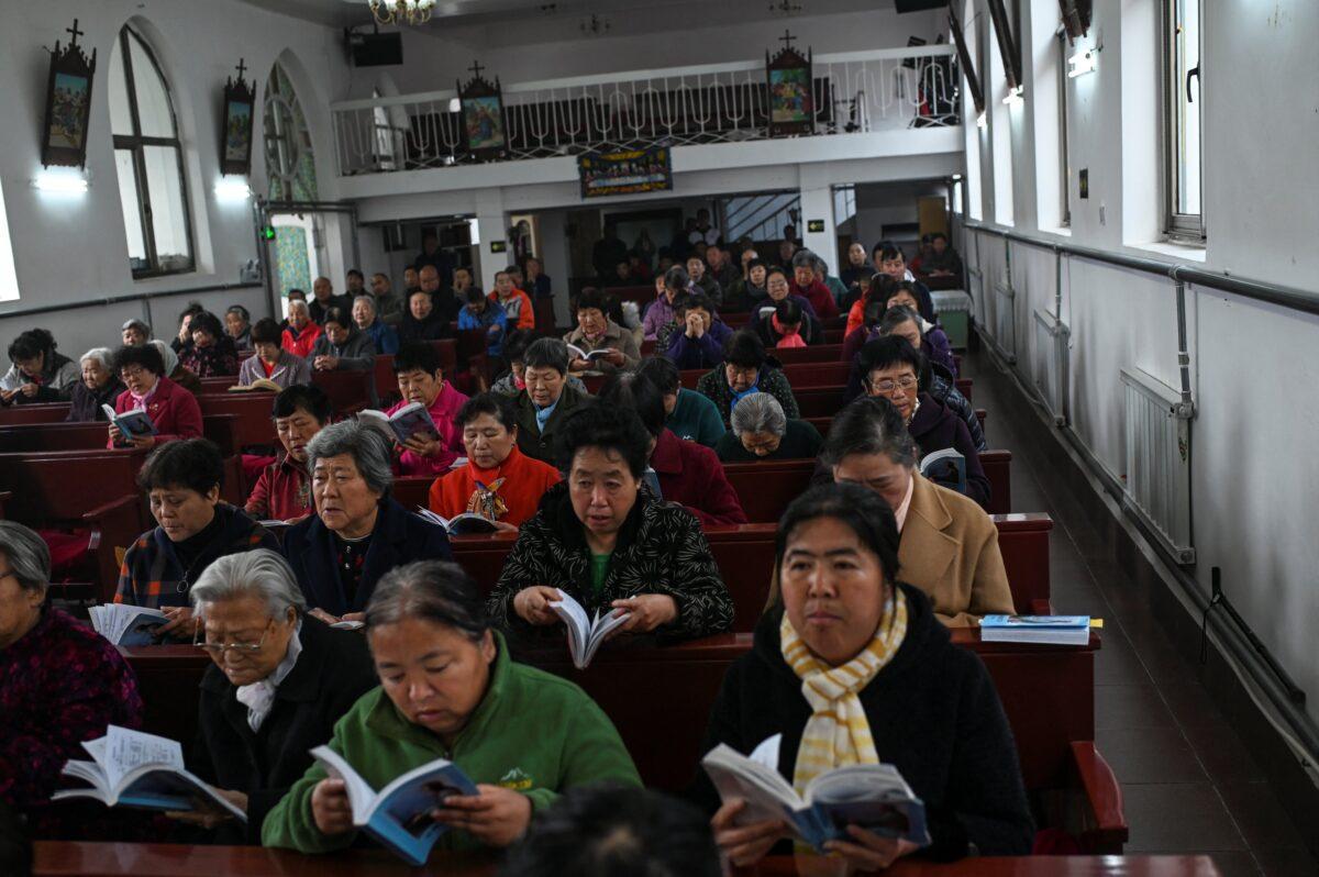 Catholic worshippers attend a morning mass on Easter Sunday at a Catholic church in a village near Beijing on April 4, 2021. (Jade Gao/AFP via Getty Images)