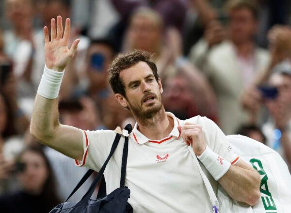 Great Britain's Andy Murray leaves court after losing his third round match against Canada's Denis Shapovalov at the Wimbledon Tennis Championships in London, Britain, on July 2, 2021. (Peter Nicholls/Reuters)