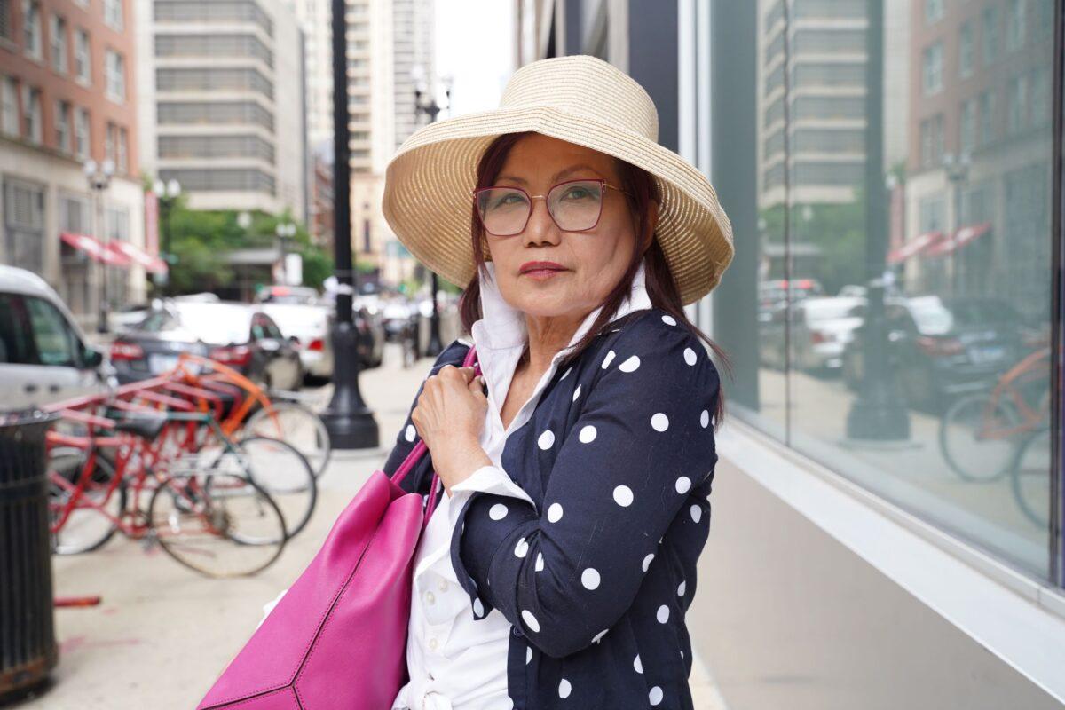 Ming Sison in the Gold Coast neighborhood in Chicago on June 21, 2021. (Cara Ding/Epoch Times)