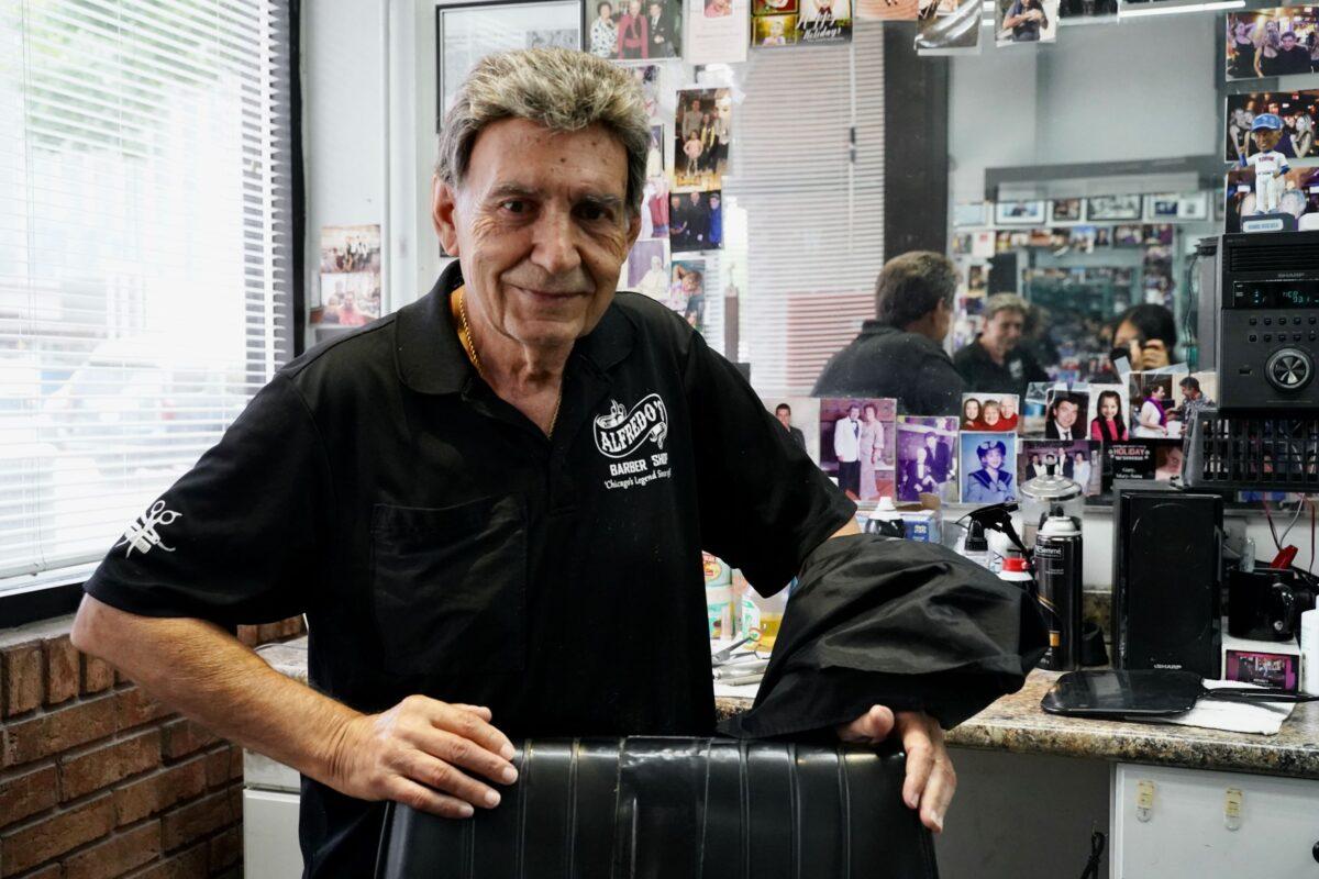 Alfredo Fricano at his barbershop in the Gold Coast neighborhood in downtown Chicago on June 21, 2021. (Cara Ding/Epoch Times)
