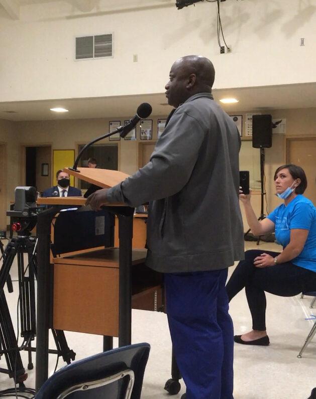 Youth pastor Gabriel Williams (L) speaks at a school board meeting while parent Kelly Schenkoske listens, in Salinas, Calif., on June 22, 2021. (Courtesy Christine McCuistion)