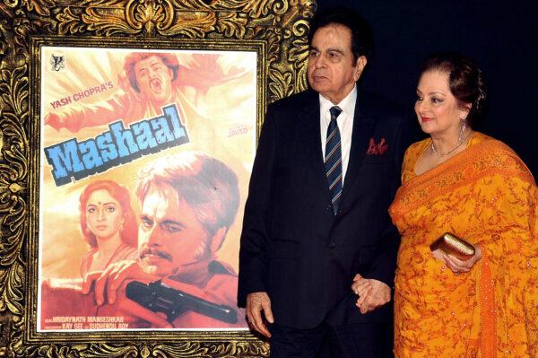 Bollywood film actor Dilip Kumar (L) and his wife Saira Banu pose on the red carpet at the premiere of the Hindi film 'Jab Tak Hai Jaan' in Mumbai, India, on Nov. 12, 2012. (STR/AFP via Getty Images)