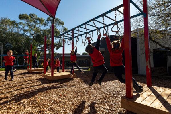 Students play at recess at Lysterfield Primary School on May 26, 2020, in Melbourne, Australia. (Daniel Pockett/Getty Images)