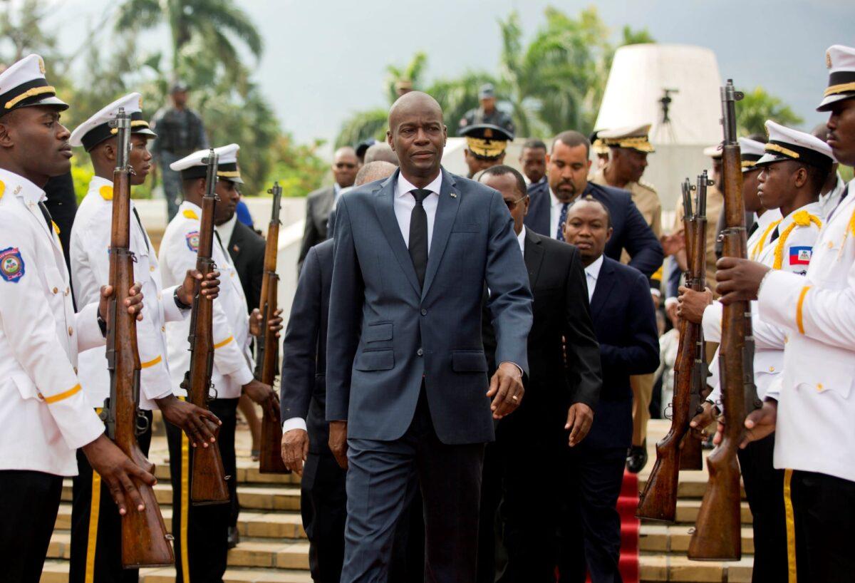 Haiti's President Jovenel Moise (C) leaves the museum during a ceremony marking the 215th anniversary of revolutionary hero Toussaint Louverture's death, at the National Pantheon museum in Port-au-Prince, Haiti, on April 7, 2018. (Dieu Nalio Chery/File/AP Photo)