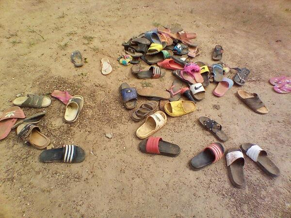 Footwear of the abducted students of Bethel Baptist High School in Damishi, Kaduna, Nigeria July 7, 2021. (Bosan Yakusak/Reuters)