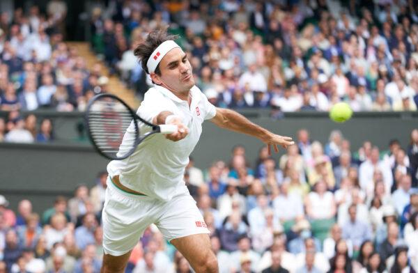 Switzerland's Roger Federer plays against Poland's Hubert Hurkacz in the quarterfinals at The Wimbledon Tennis Championships in London on July 7, 2021. (Peter van den Berg/USA TODAY Sports via Reuters)