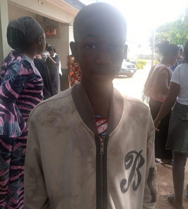 Saph Dominic Bodam, 15, who escaped from kidnappers and returned to Bethel Baptist High School, in Kaduna State, Nigeria, on July 5, 2021. (Luka Binniyat/The Epoch Times)