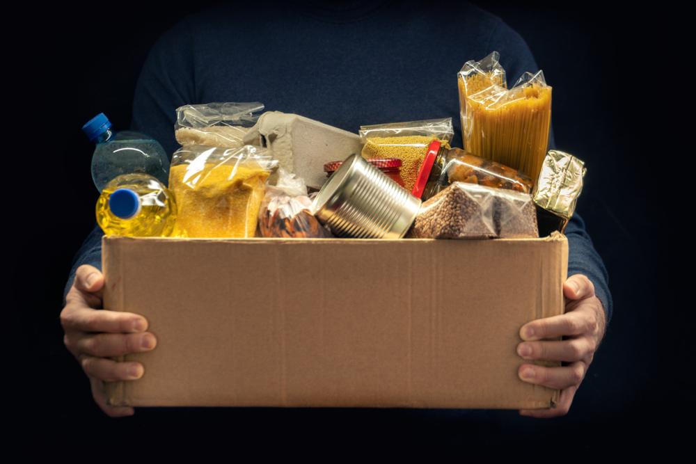 Declutter your pantry and consider boxing up unwanted, unopened nonperishables to donate. (Storm A/Shutterstock)