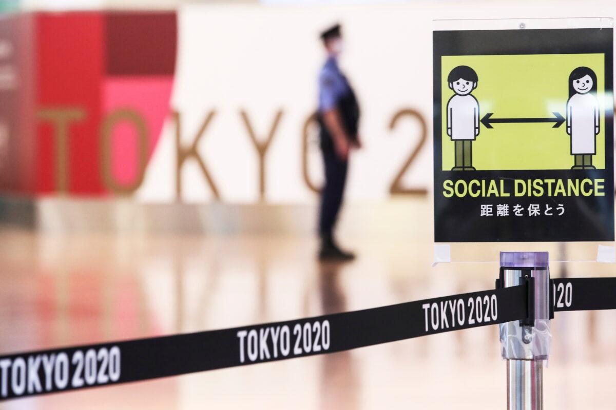 A social distancing sign is seen at Haneda Airport ahead of Tokyo 2020 Olympic Games, in Tokyo, Japan, on July 8, 2021. (Kim Kyung-Hoon/Reuters)
