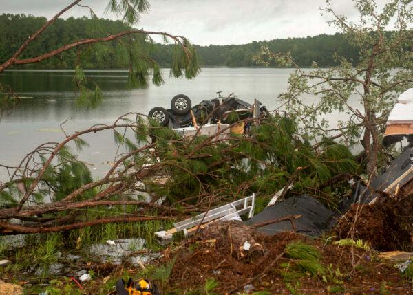Debris covers the ground after a tornado on Wednesday struck the on-base RV park on Naval Submarine Base Kings Bay in Kings Gay, Ga., on July 8, 2021. (Mass Communication 3rd Class Aaron Xavier Saldana/U.S. Navy via AP)
