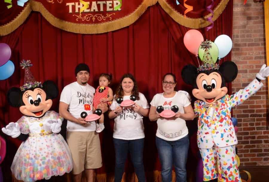 Christine Taala (R) with her husband Talmage, and two daughters during the triplets' gender reveal surprise at Walt Disney World in 2018. (Courtesy of <a href="https://www.instagram.com/the_taala_girls/">Christine Taala</a>)