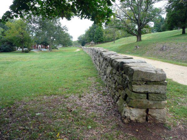 The sunken road on Marye's Heights, Fredericksburg, Va. Approximately 3,000 Georgians under Thomas R.R. Cobb lined up in multiple ranks behind the stone wall, and another 3,000 were atop the slope behind it, along with their artillery. (Public Domain)