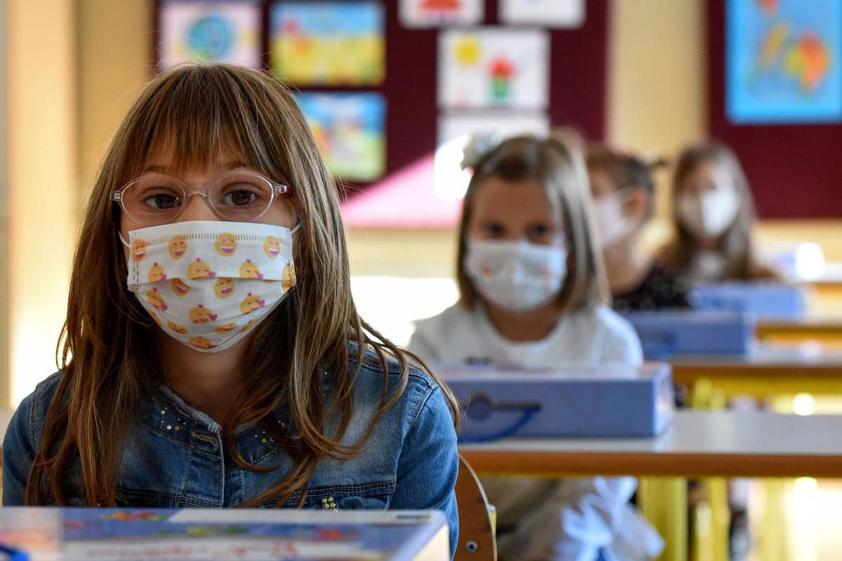 Montenegrin schoolchildren wearing protective masks to prevent the spread of the Covid-19 in Podgorica, on Sept. 30, 2020. (Savo Prelevic/AFP via Getty Images)