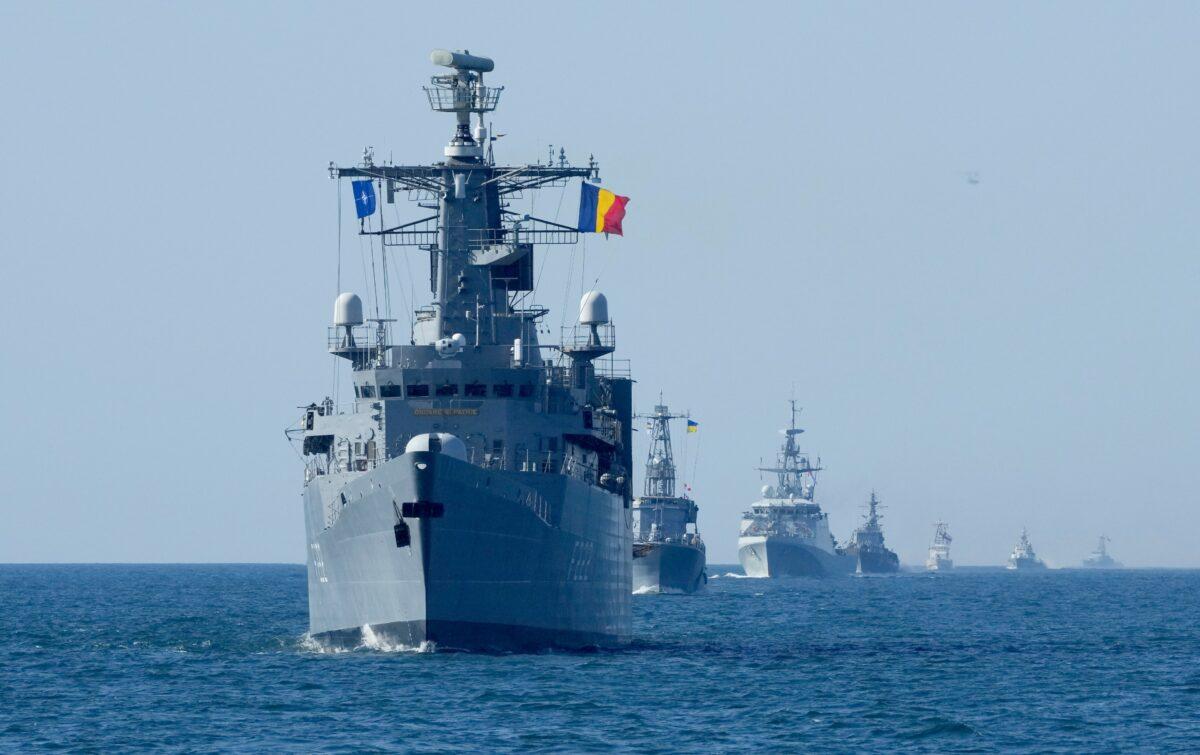 NATO warships are in battle formation during Sea Breeze 2021 maneuvers, in the Black Sea, on July 9, 2021. Ukraine and NATO have conducted Black Sea drills involving dozens of warships in a two-week show of their strong defense ties and capability. (Efrem Lukatsky/AP Photo)