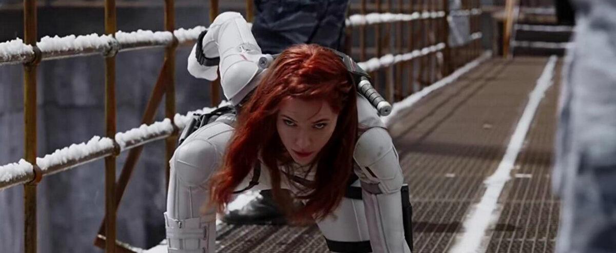 Black Widow (Scarlett Johansson) doing one version of the superhero landing pose, in “Black Widow.” (Marvel/DisneyPlus)