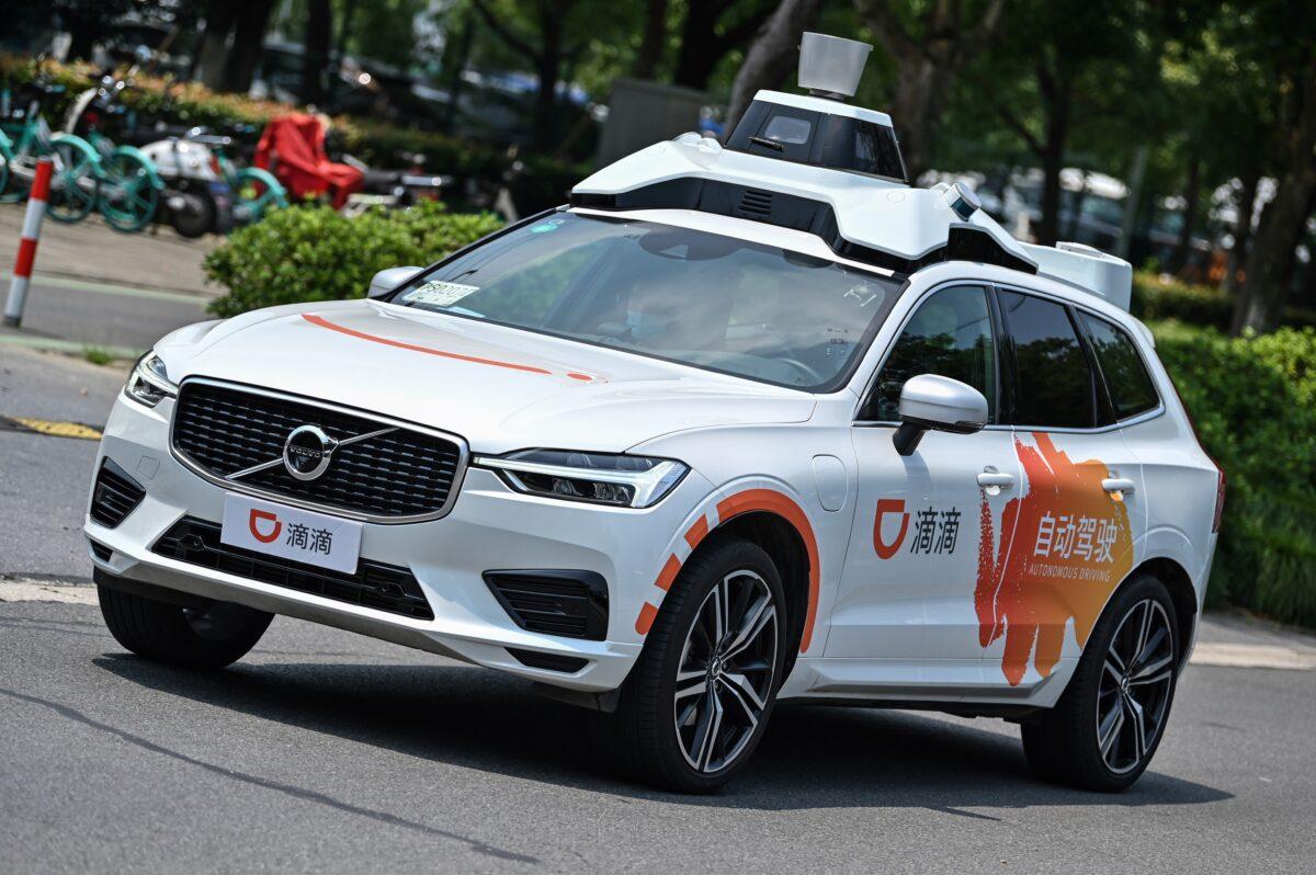 A Didi autonomous taxi is performing a pilot test drive on the streets in Shanghai, on July 22, 2020. (Hector Retamal/AFP via Getty Images)