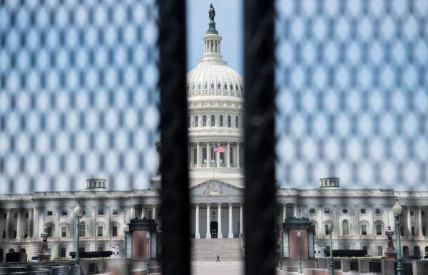 A tall security fence surrounds the US Capitol ahead of President Joe Biden's address to a joint session of Congress in Washington, on April 28, 2021. (Saul Loeb/AFP via Getty Images)